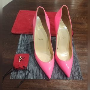 Hot pink Christian Louboutin red bottoms. Sexy.